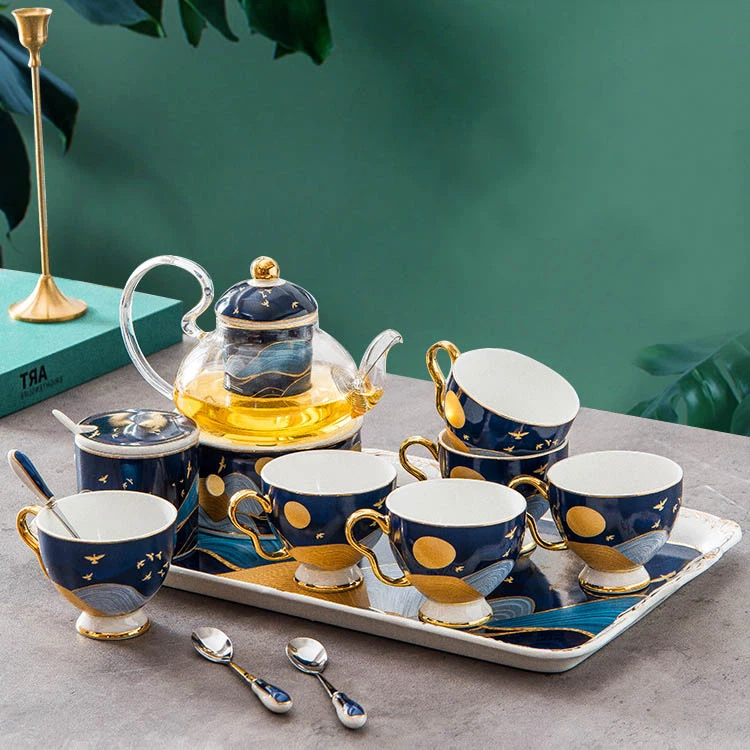 কাপ সহ চায়ের পটল সেট